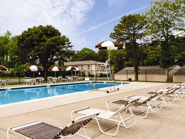 in ground pool and lounge chairs at Lakeside Village, East Patchogue
